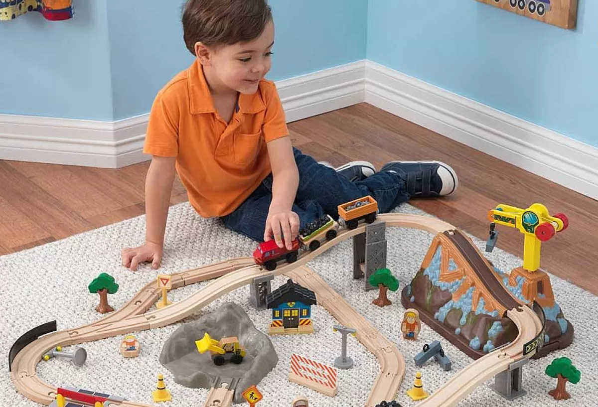 Kidkraft - Chemin de Fer Éducatif en Bois avec Accessoires | Jouet Évolutif pour Enfants 3+ Ans | Set de Construction Créatif