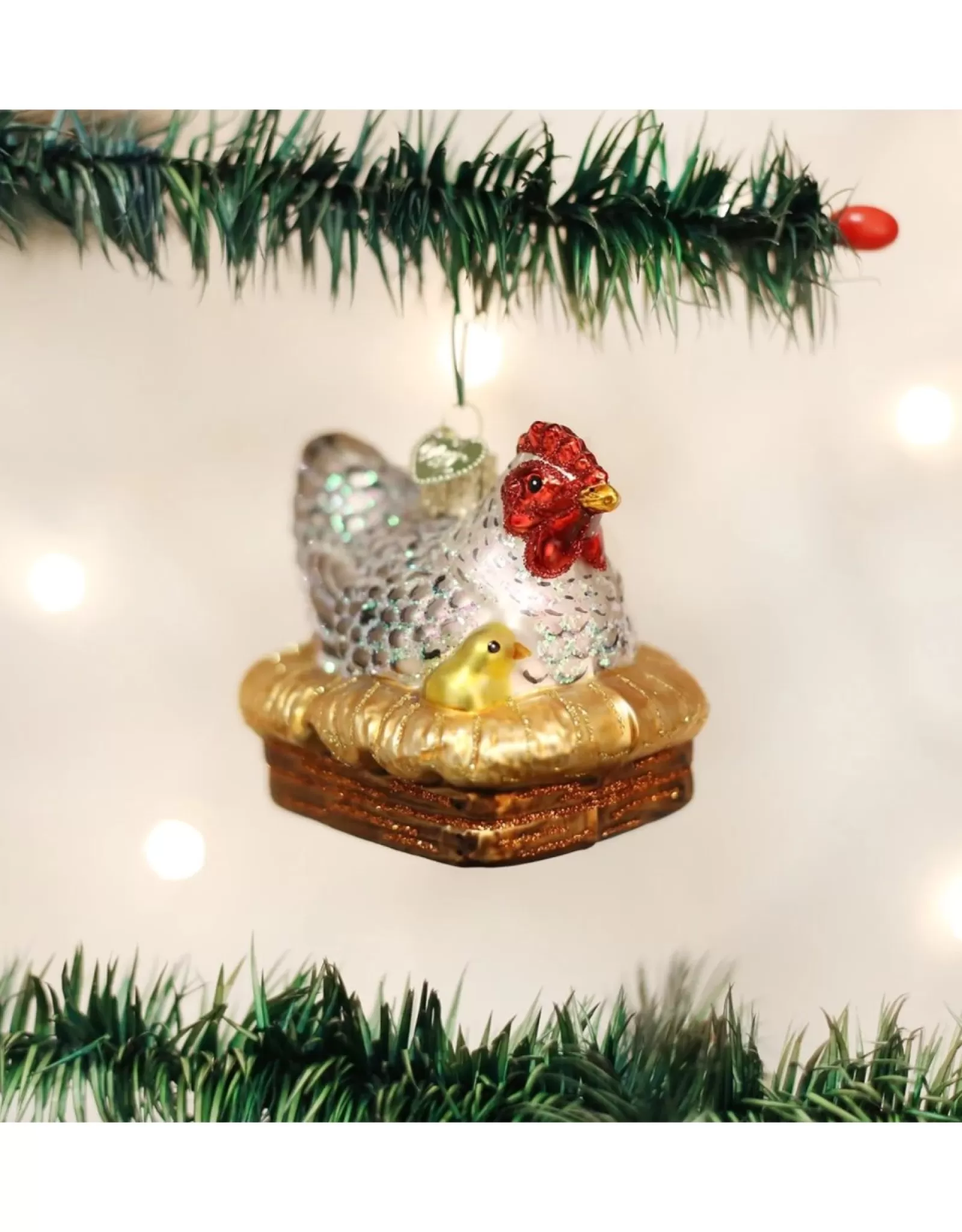 Décoration de Noël Ancien Monde : Poule sur son nid en porcelaine - Élégant ornement traditionnel