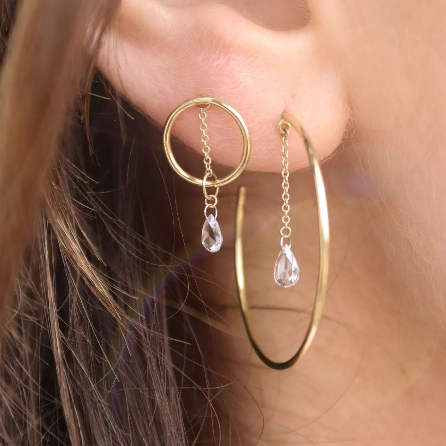 Boucle d'oreille soleil Alkemistry - Création unique en or jaune 18 carats serti de diamants taille rose  

Cette version intègre des formulations typiquement utilisées dans la joaillerie française (